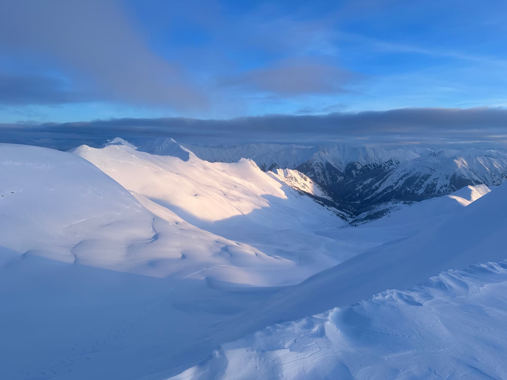 Glacier calving face with deep blue ice