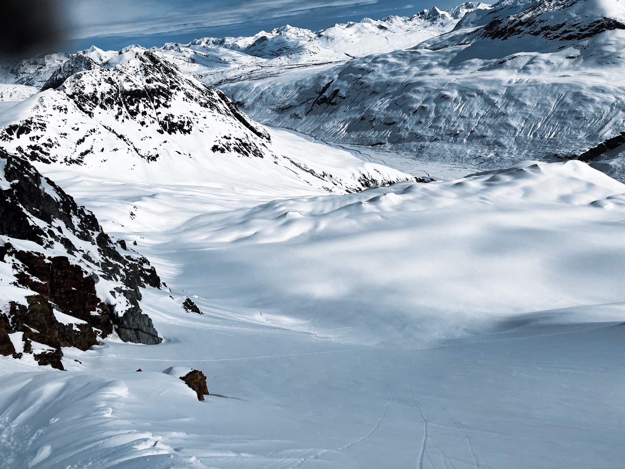 Panoramic view of a glacier meeting a fjord